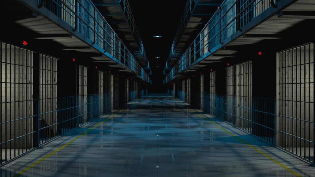 3D render of an internal prison corridor at night